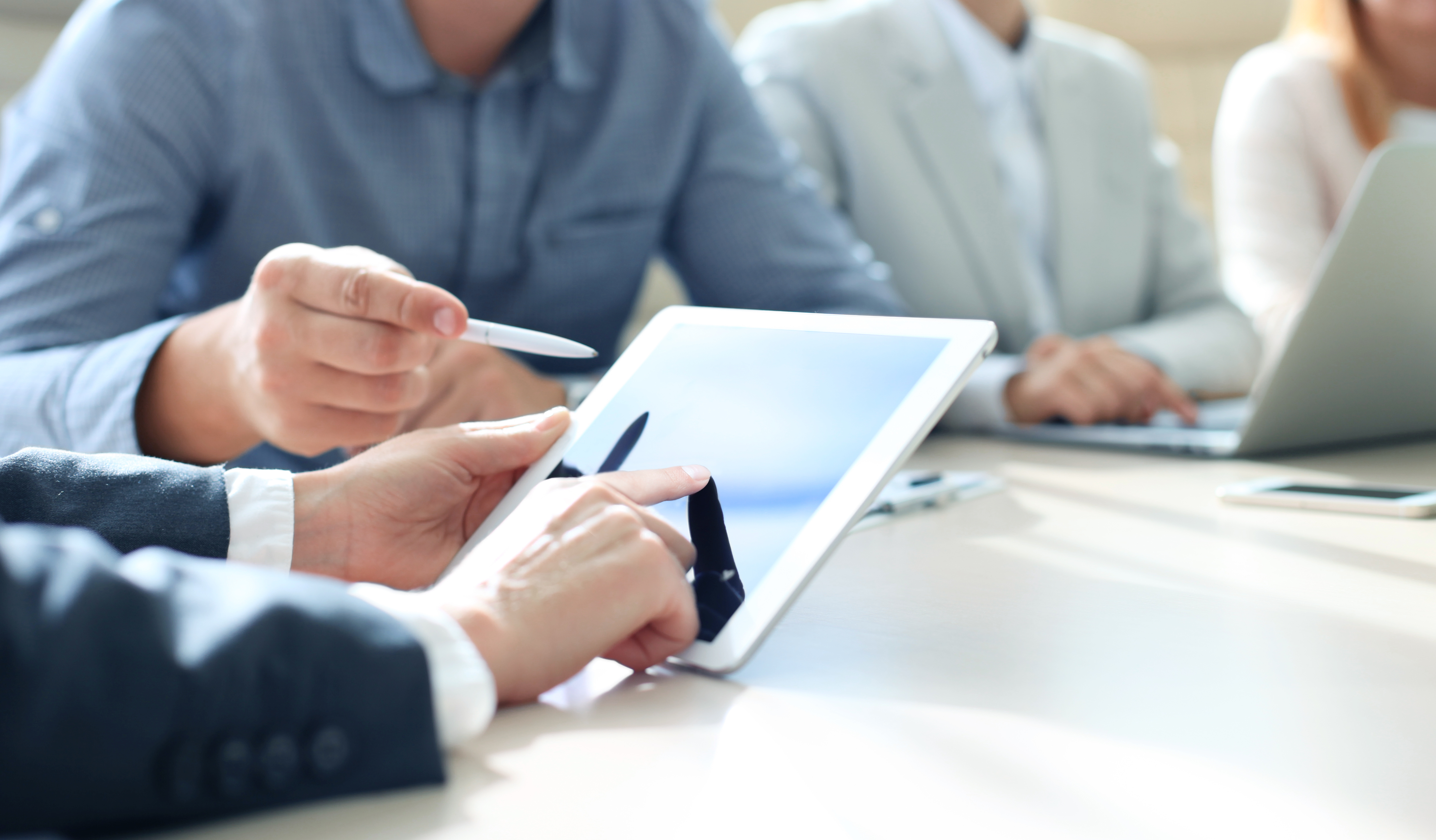 Man Pointing At The Tablet